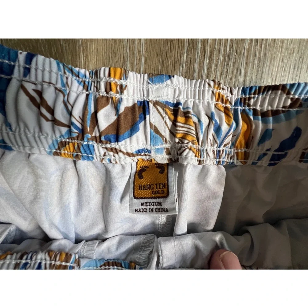 Hang Ten Gold Swim Trunks Mens Medium White Tropical Leaf Print Excellent Shorts